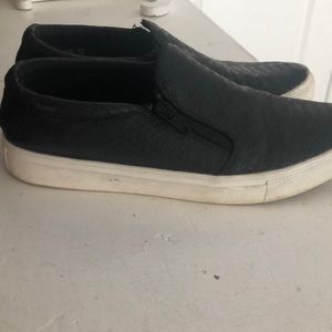 Report black slip on shoes!